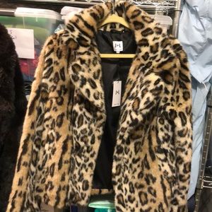 Vintage looking faux fur animal print jacket.